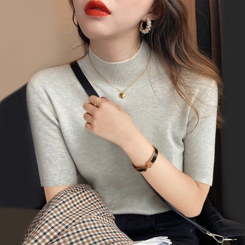 Inner layer of the top is a thin knitted sweater.